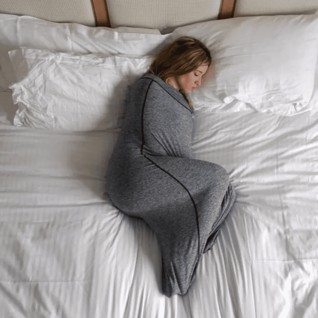 Woman swaddled in Sleep Pod Classic